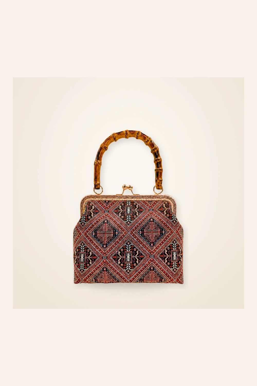 Front view of woven mini frame bag Longevity Blossom · Cinnabar Red in handwoven brocade