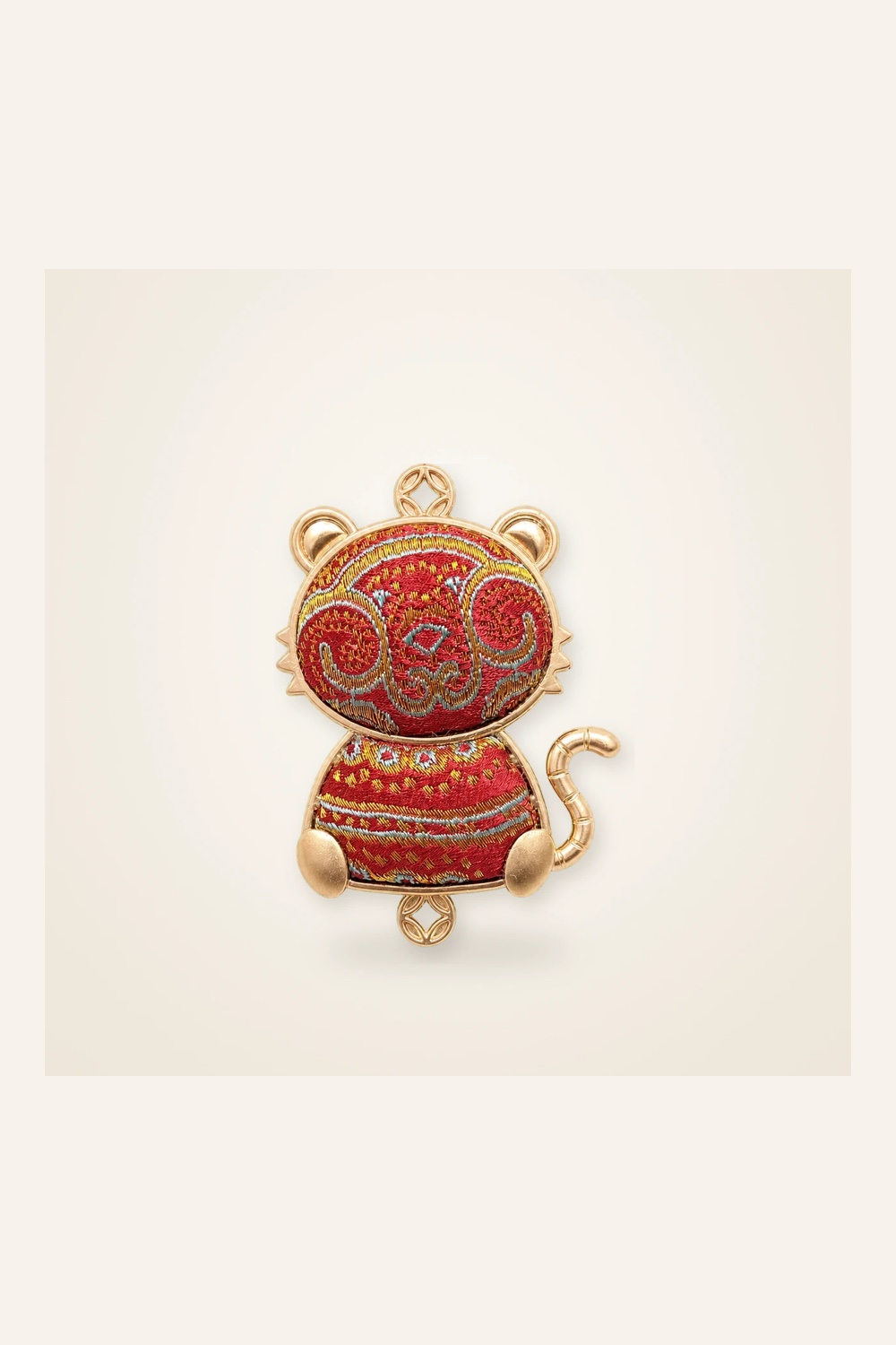 Front view of handmade textile figure Zodiac Guardians · Golden Monkey in handwoven brocade