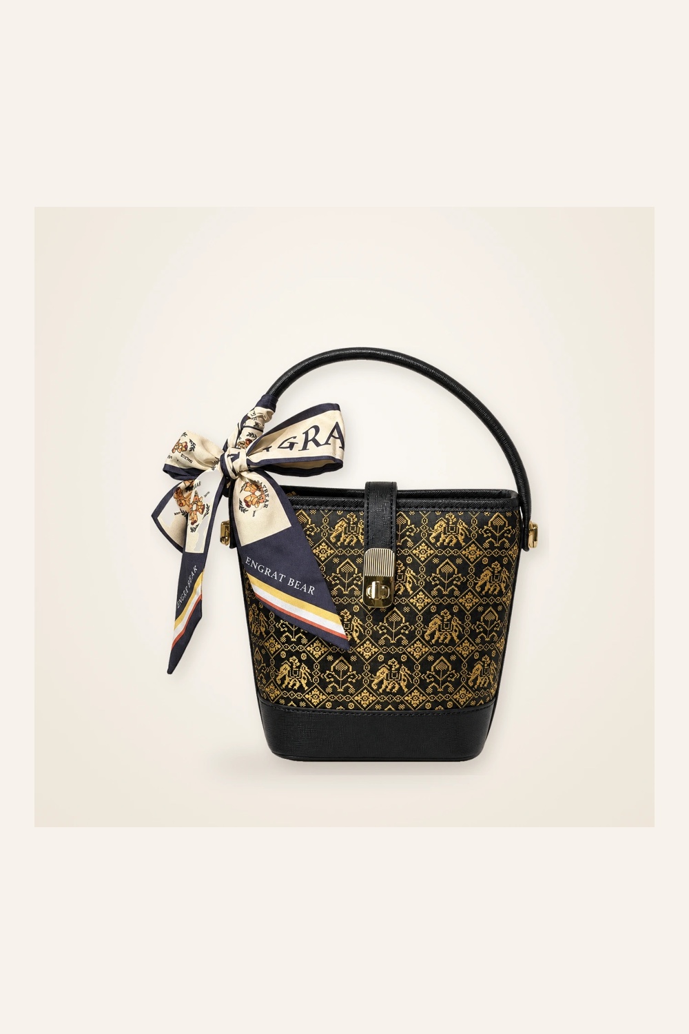 Front view of woven bucket bag Myriad Forms · Gilded Night in handwoven brocade
