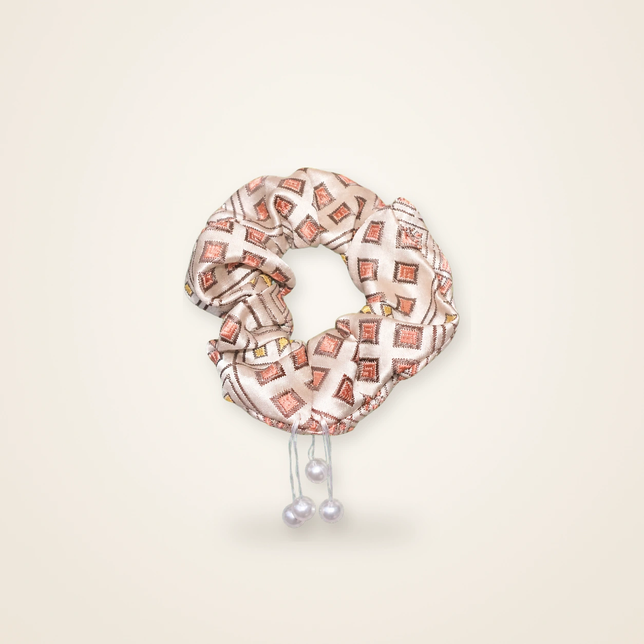 Front view of brocade scrunchie Brocade Halo · Amber Pastoral, handwoven brocade woven in the field-of-blessings motif