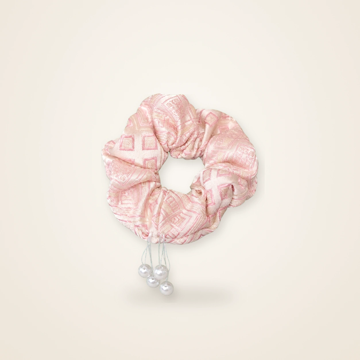 Front view of brocade scrunchie Brocade Halo · Blush Butterfly & Blossom, handwoven brocade woven in the butterfly-and-blossom motif