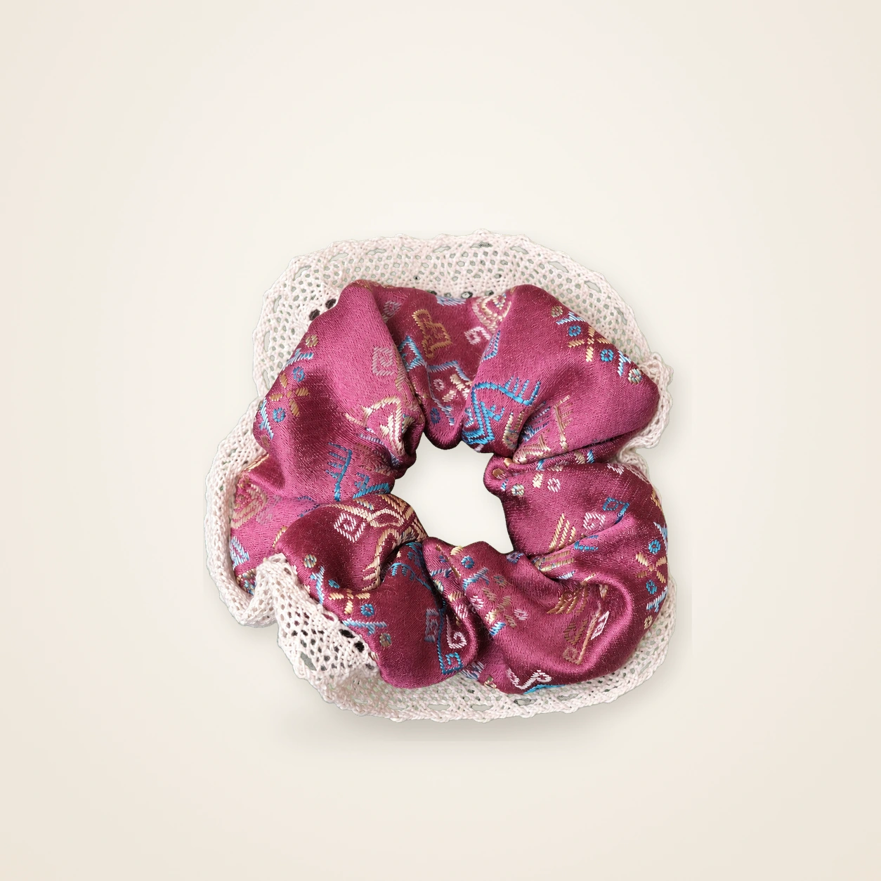 Front view of brocade scrunchie Brocade Halo · Amethyst Lone Phoenix, handwoven brocade woven in the phoenix and phoenix-blossom motif