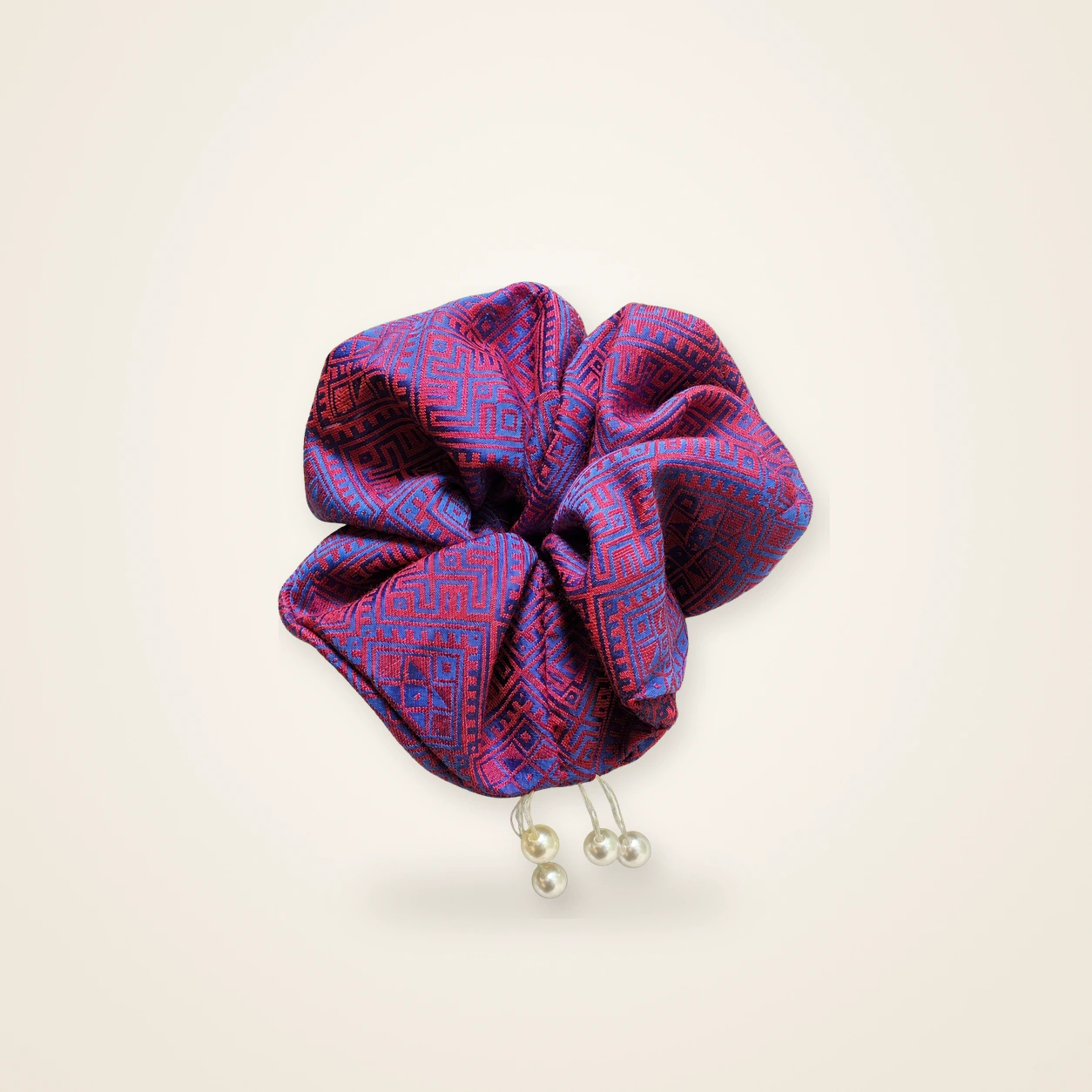 Front view of brocade scrunchie Brocade Halo · Violet Swallow, handwoven brocade woven in the swallows-greeting-the-blossom motif