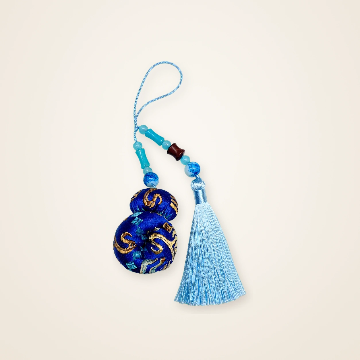 Front view of brocade bag charm Brocade Tassel · Blue Phoenix, handwoven brocade made as a brocade tassel charm