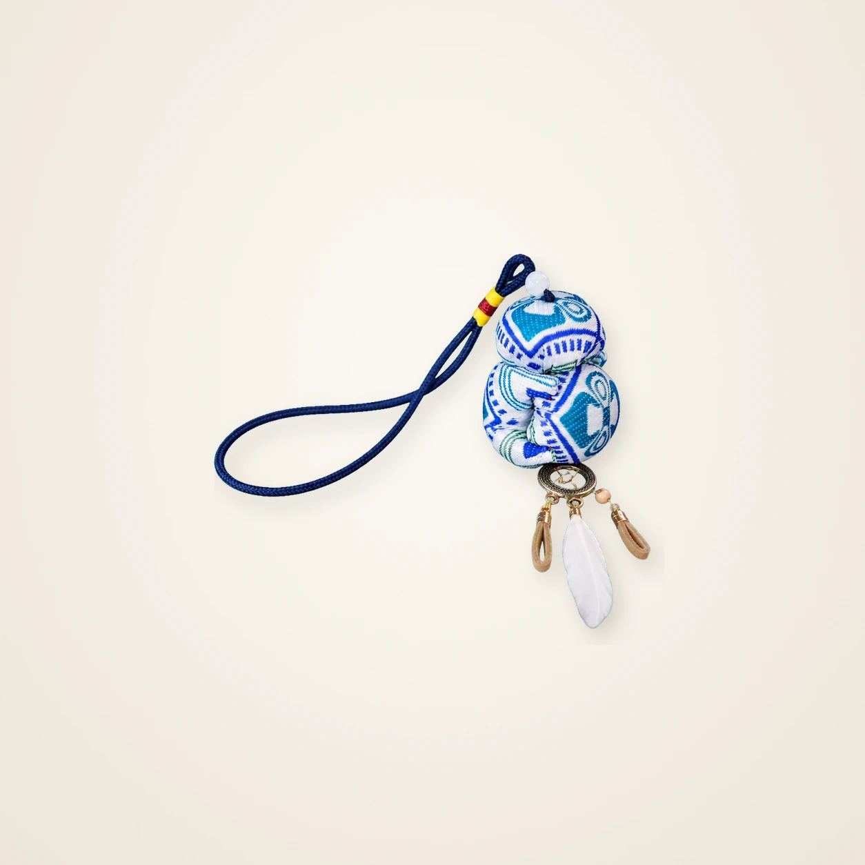 Front view of brocade bag charm Brocade Tassel · Blue Floral Coverlet Motif, handwoven brocade woven in the xilankapu coverlet motif