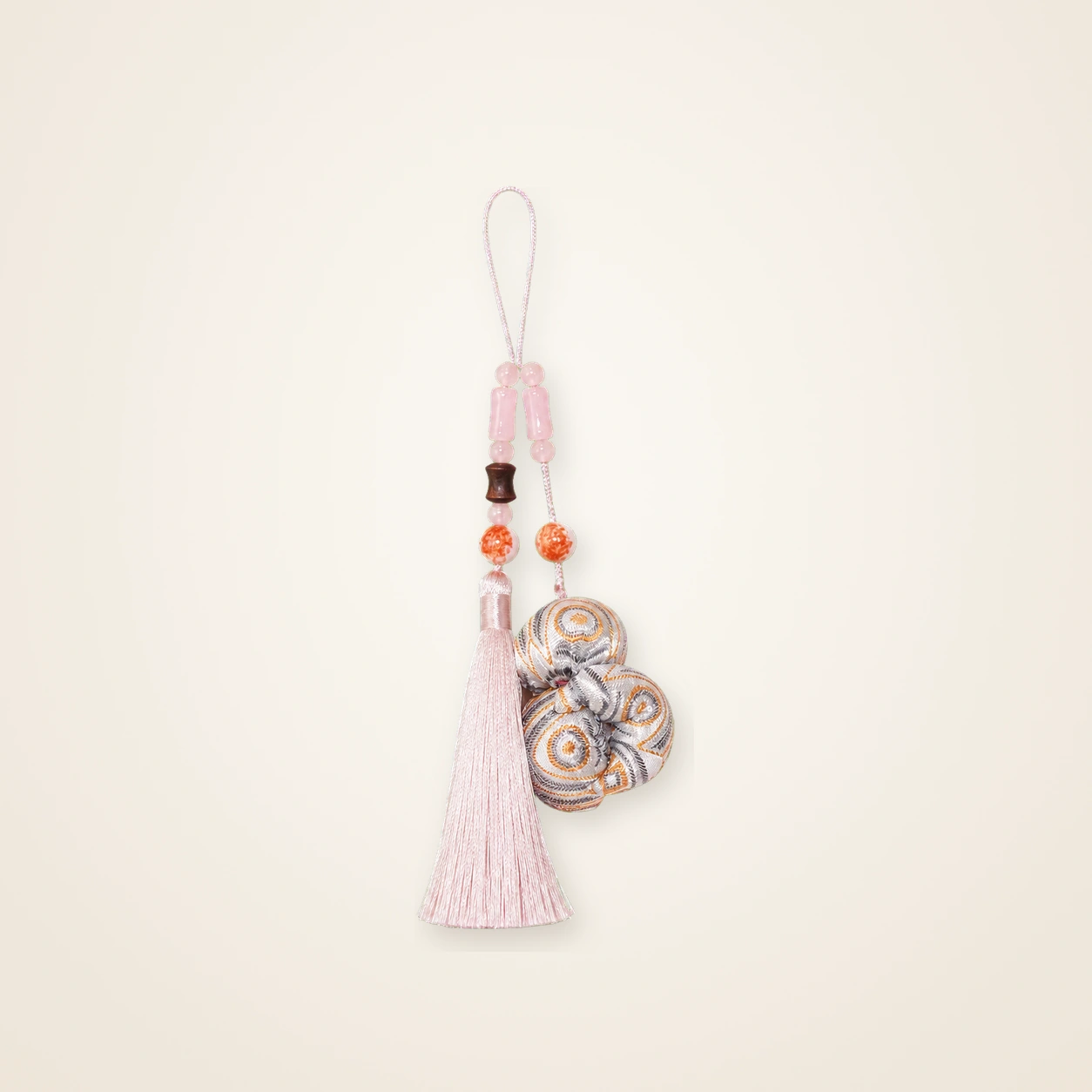Front view of brocade bag charm Brocade Tassel · Golden Yellow, handwoven brocade made as a brocade tassel charm