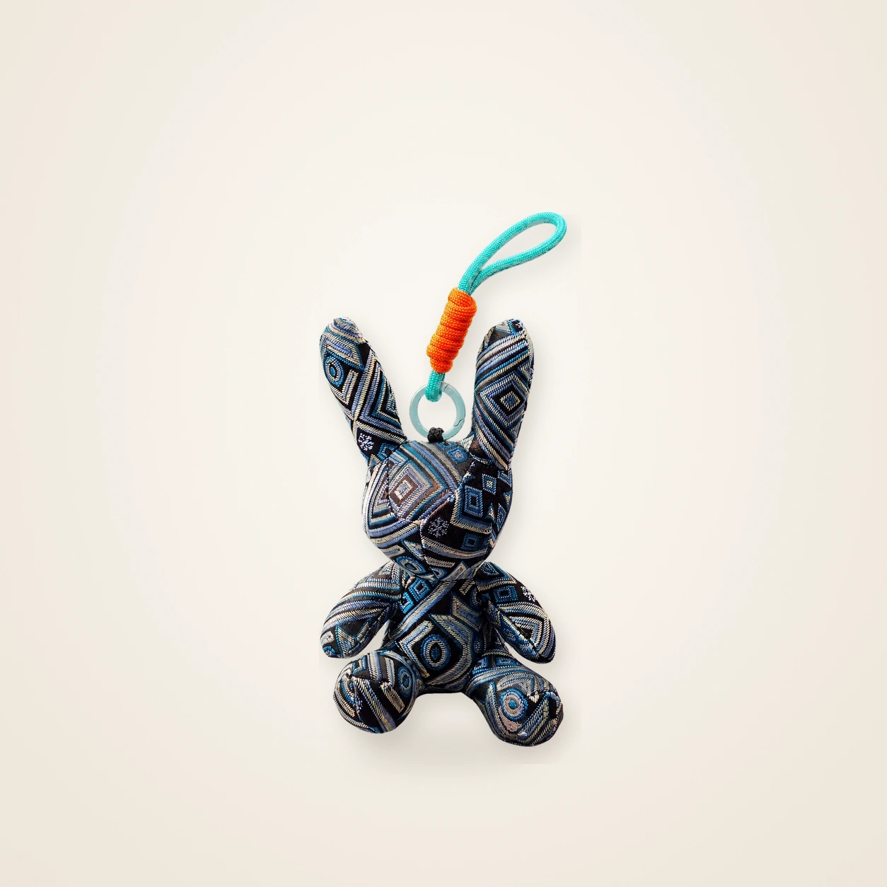 Front view of handmade textile figure Brocade Rabbit · Deep Navy, handwoven brocade made as a brocade rabbit