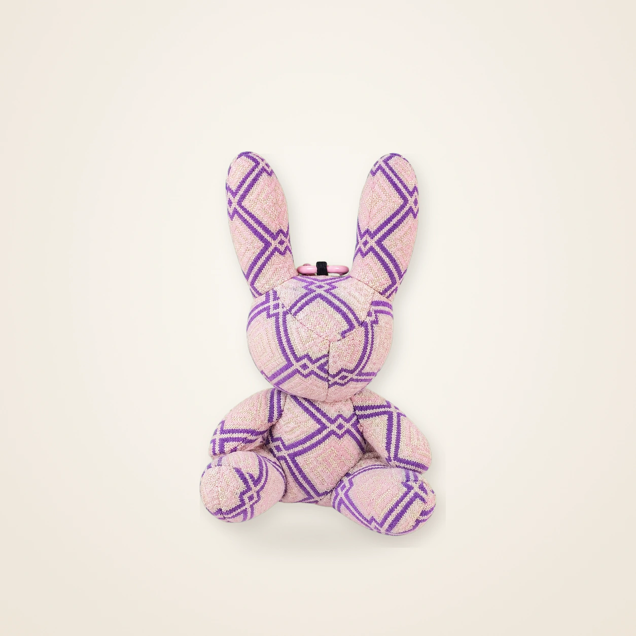 Front view of handmade textile figure Brocade Rabbit · Wisteria, handwoven brocade made as a brocade rabbit