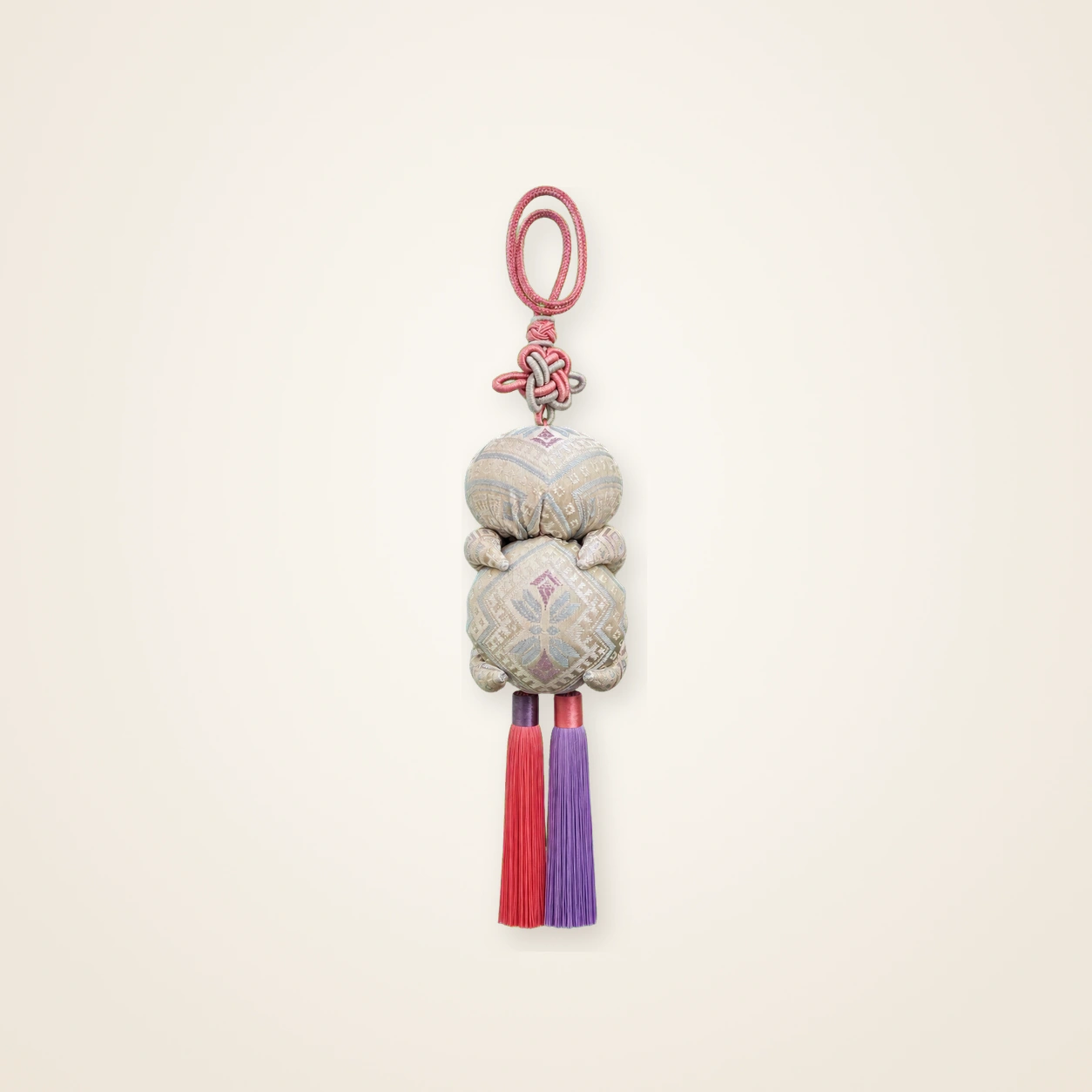 Front view of brocade bag charm Seven-Centimetre Sachet · Silver-White Butterfly, handwoven brocade woven in the butterfly-and-blossom motif