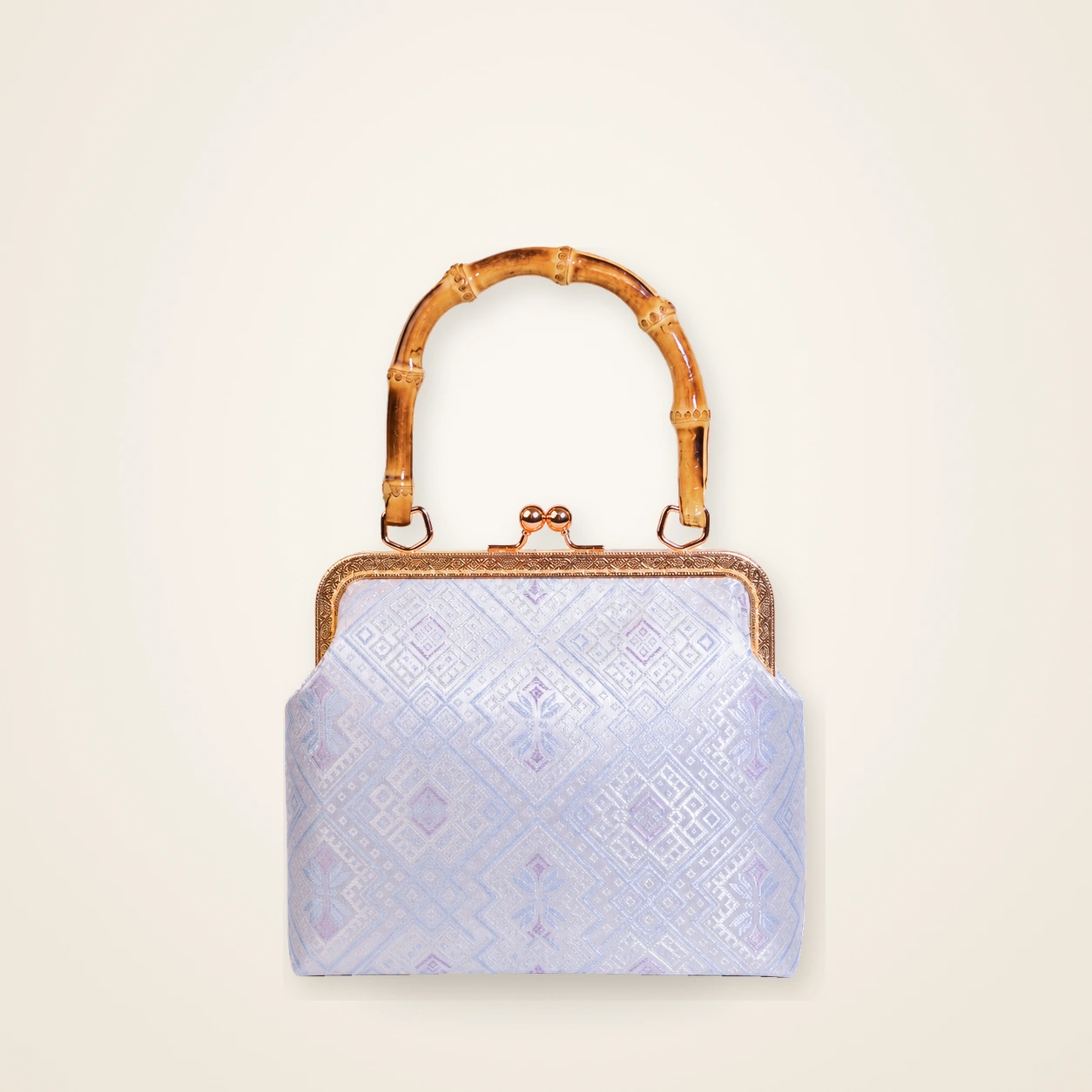 Front view of woven mini frame bag Butterfly Shadow · Silver White, handwoven brocade woven in the butterfly-and-blossom motif