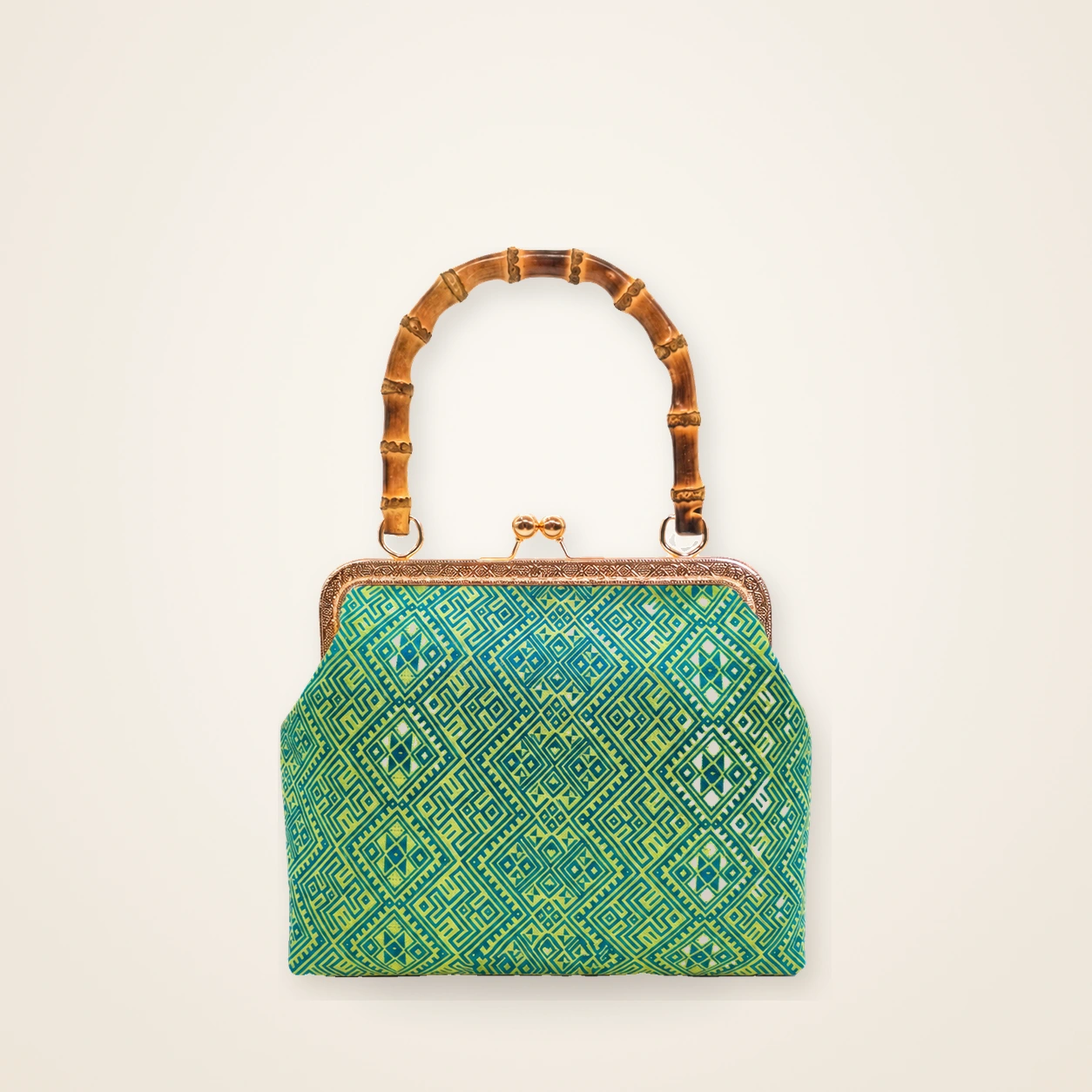 Front view of woven mini frame bag Twin Swallows · Jade Green, handwoven brocade woven in the swallows-greeting-the-blossom motif