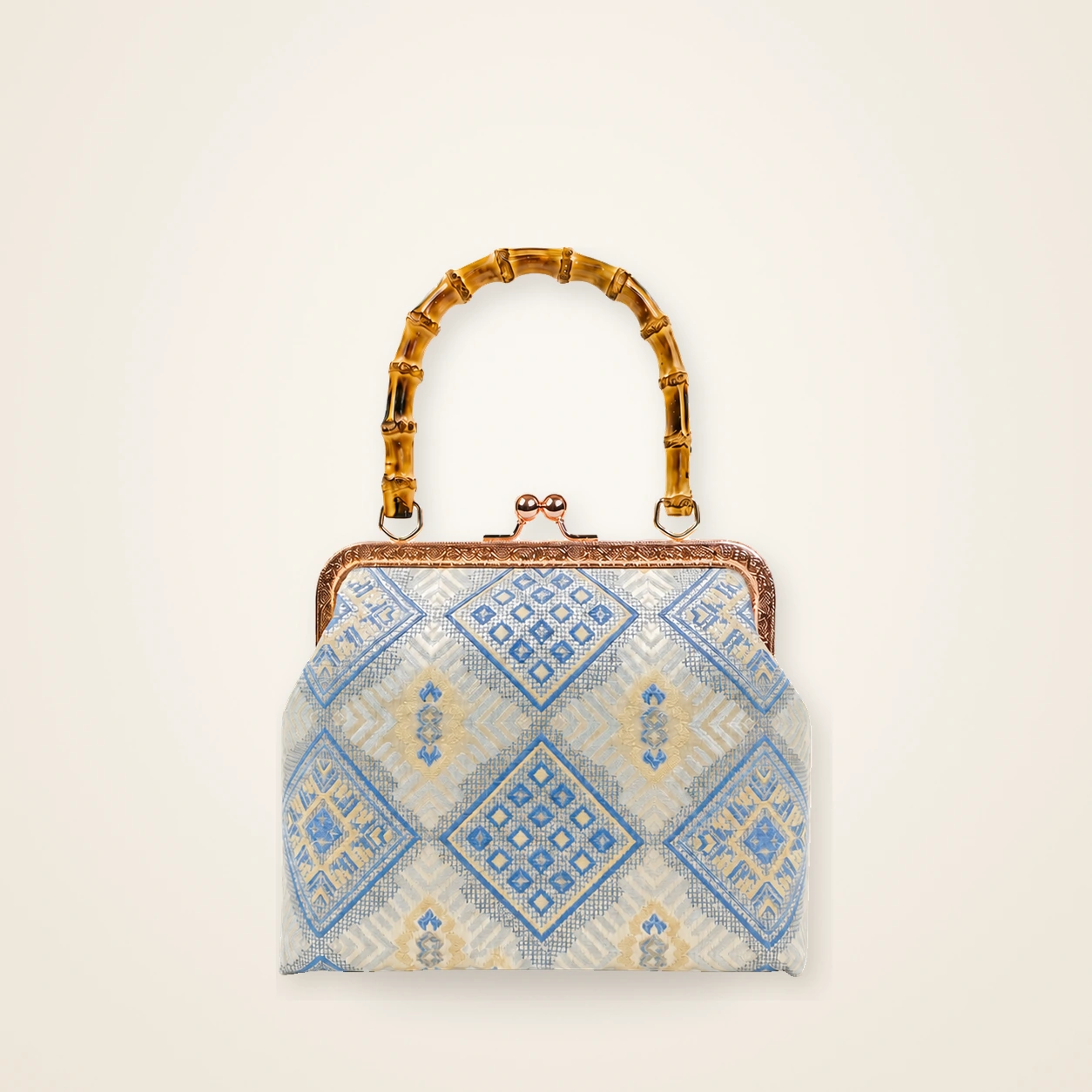 Front view of woven mini frame bag Resting Phoenix · Pale Blue, handwoven brocade woven in the phoenix and phoenix-blossom motif