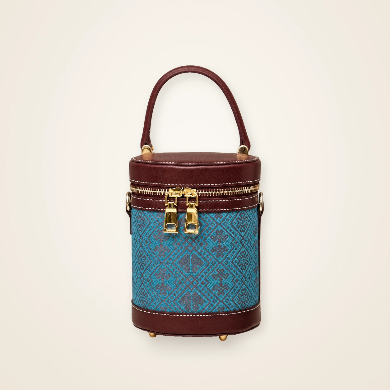 Front view of woven bucket bag Brocade Vessel · Celadon Sky, handwoven brocade woven in the cloud-and-mist motif