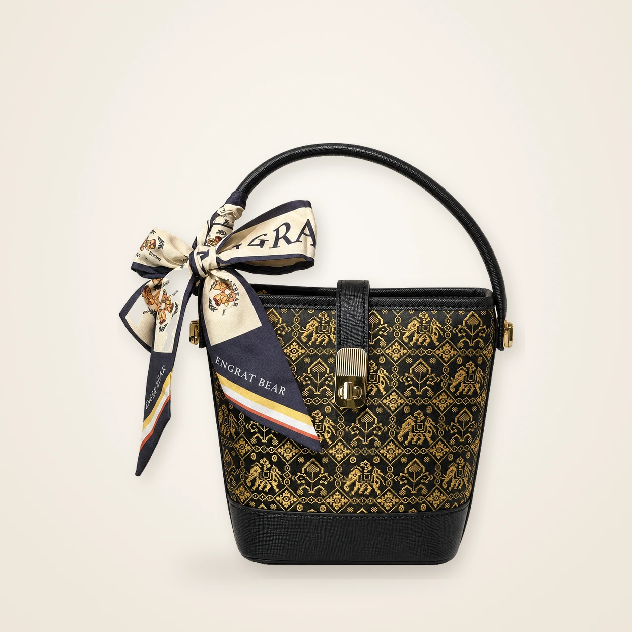 Front view of woven bucket bag Myriad Forms · Gilded Night, handwoven brocade woven in the wanxiang myriad-forms motif