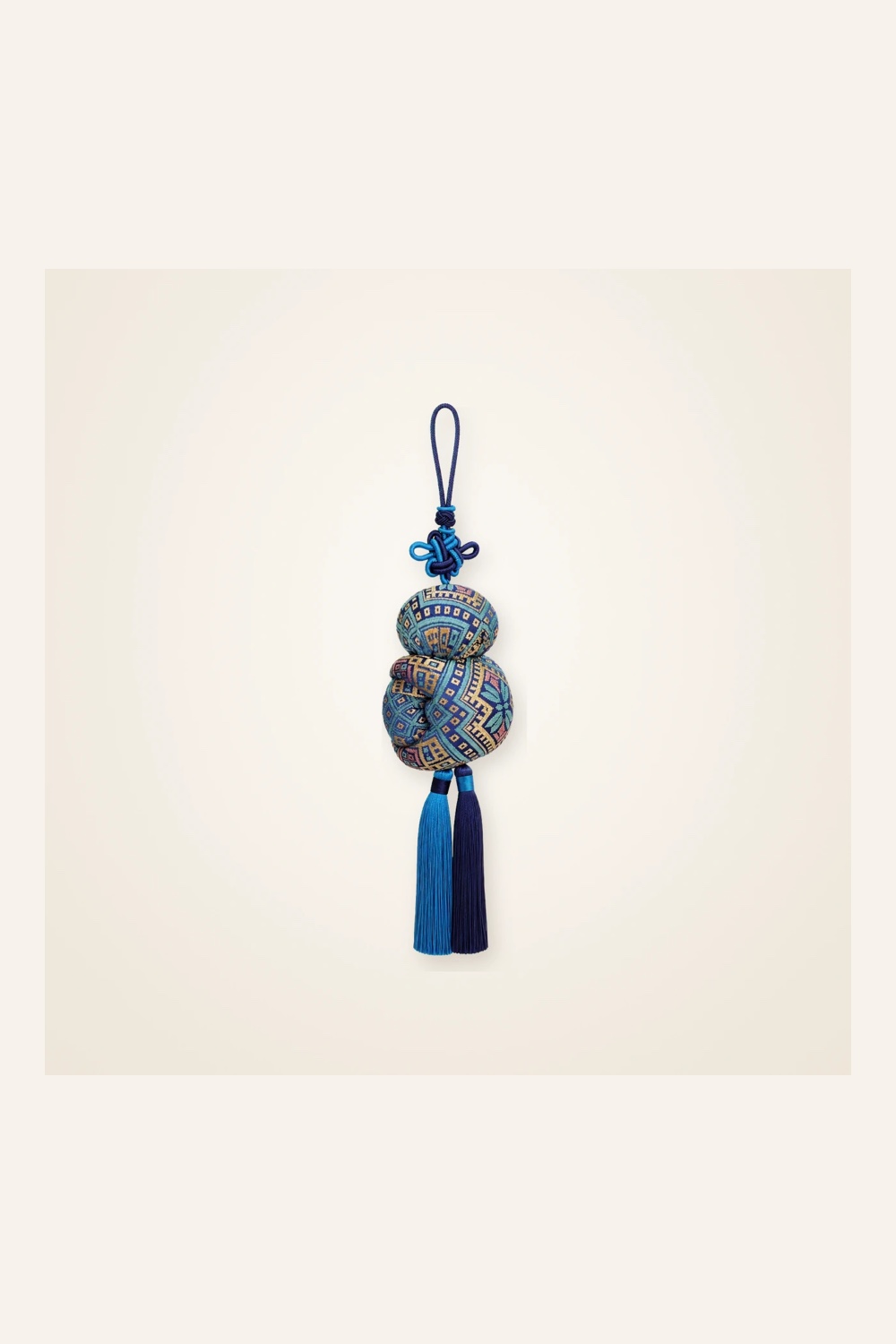 Front view of brocade bag charm Seven-Centimetre Sachet · Gold & Blue Butterfly, handwoven brocade woven in the butterfly-and-blossom motif