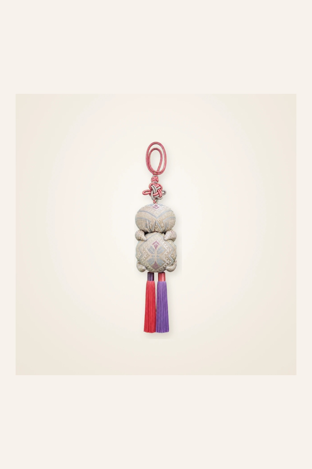 Front view of brocade bag charm Seven-Centimetre Sachet · Silver-White Butterfly, handwoven brocade woven in the butterfly-and-blossom motif