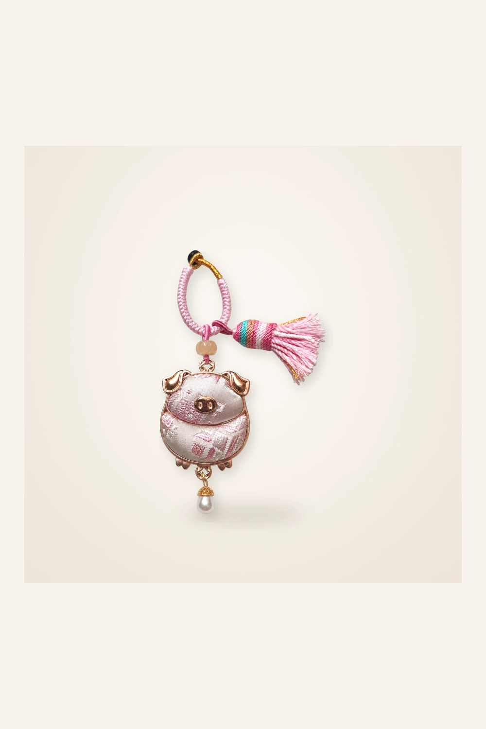 Front view of handmade textile figure Zodiac Guardians · Fortune Pig, handwoven brocade made as a Chinese zodiac guardian