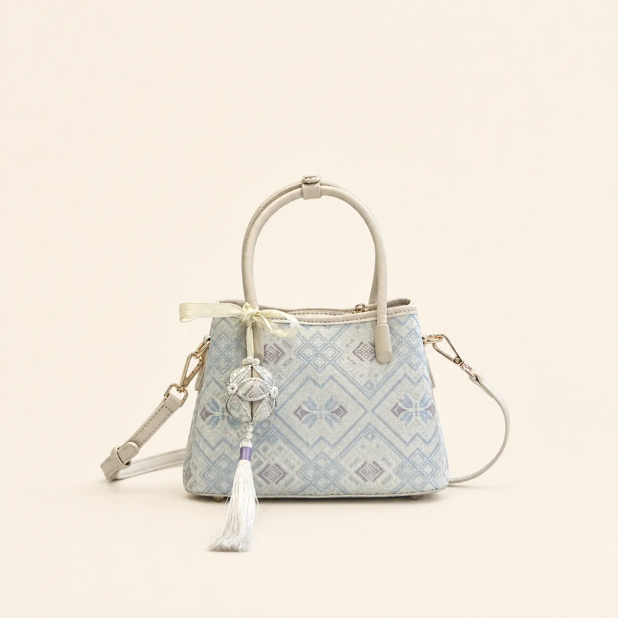 Front view of woven tote bag Cloud Mist · Whisper, handwoven brocade woven in the cloud-and-mist motif